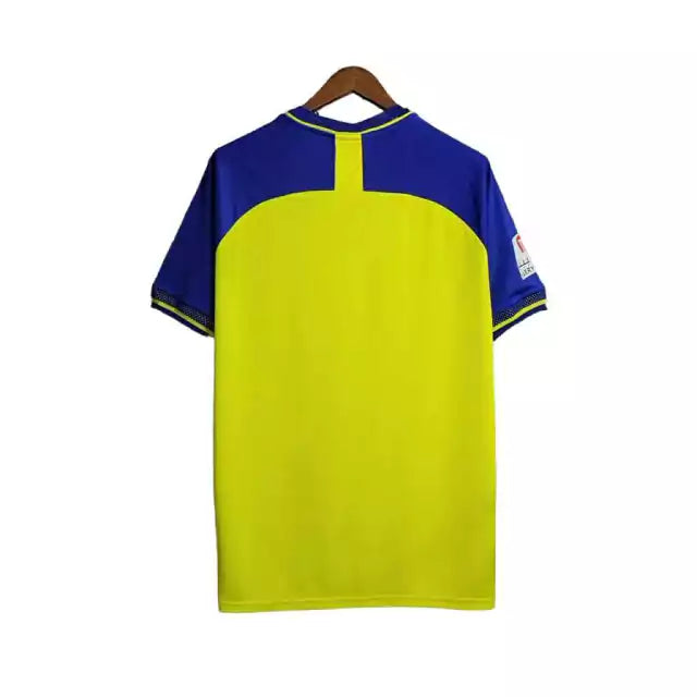 Camisa Al-Nassr I 23/24 Torcedor Masculina - Amarela com detalhes em azul